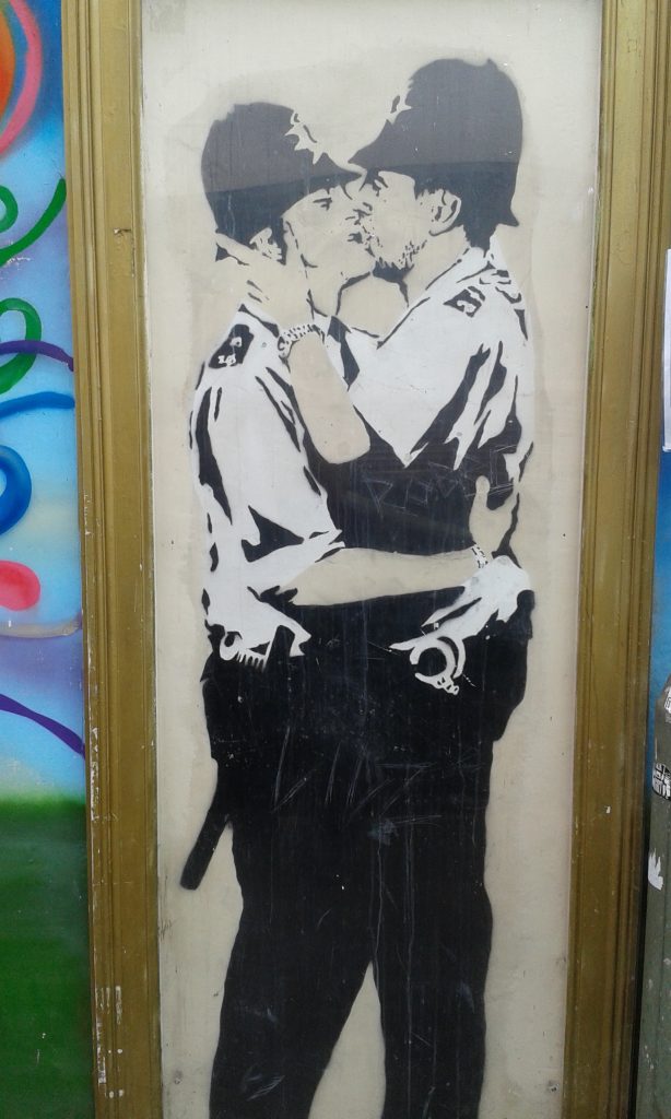 the kissing policemen - Banksy